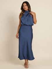 elegante jurk met luxe stof en vrouwelijke pasvorm