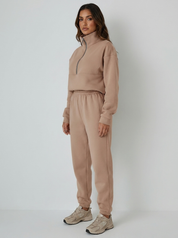 Sportieve dames set met half-zip trui en comfortabele broek