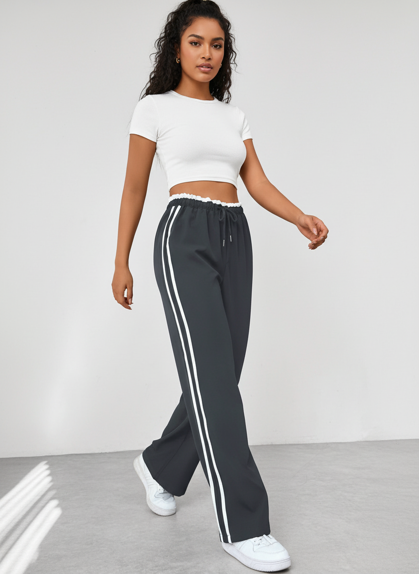Sportieve wide leg broek met hoge taille en contrasterende strepen