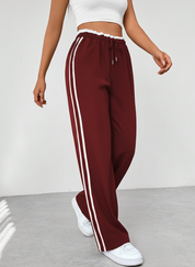 Sportieve wide leg broek met hoge taille en contrasterende strepen