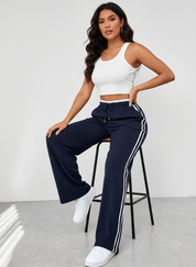 Sportieve wide leg broek met hoge taille en contrasterende strepen