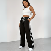 Sportieve wide leg broek met hoge taille en contrasterende strepen