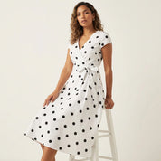 Stijlvolle dames polkadot wikkeljurk – Camille
