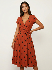 Stijlvolle dames polkadot wikkeljurk – Camille