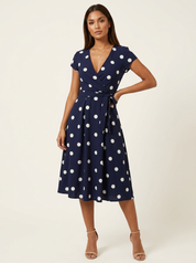 Stijlvolle dames polkadot wikkeljurk – Camille