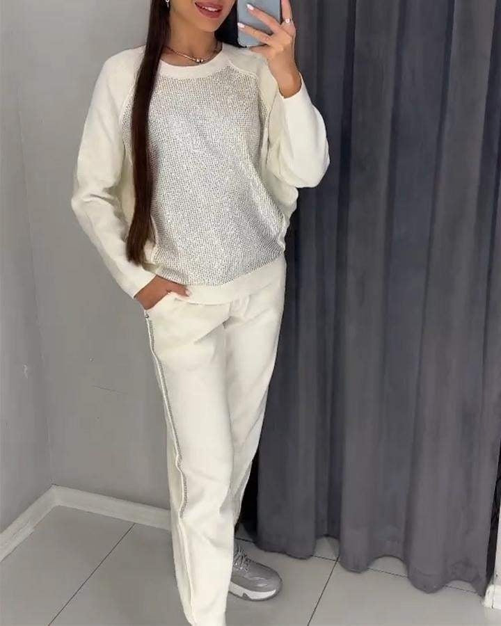 Trendy women’s suit with subtle shimmer details