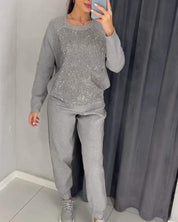 Trendy damespak met subtiele glansdetails