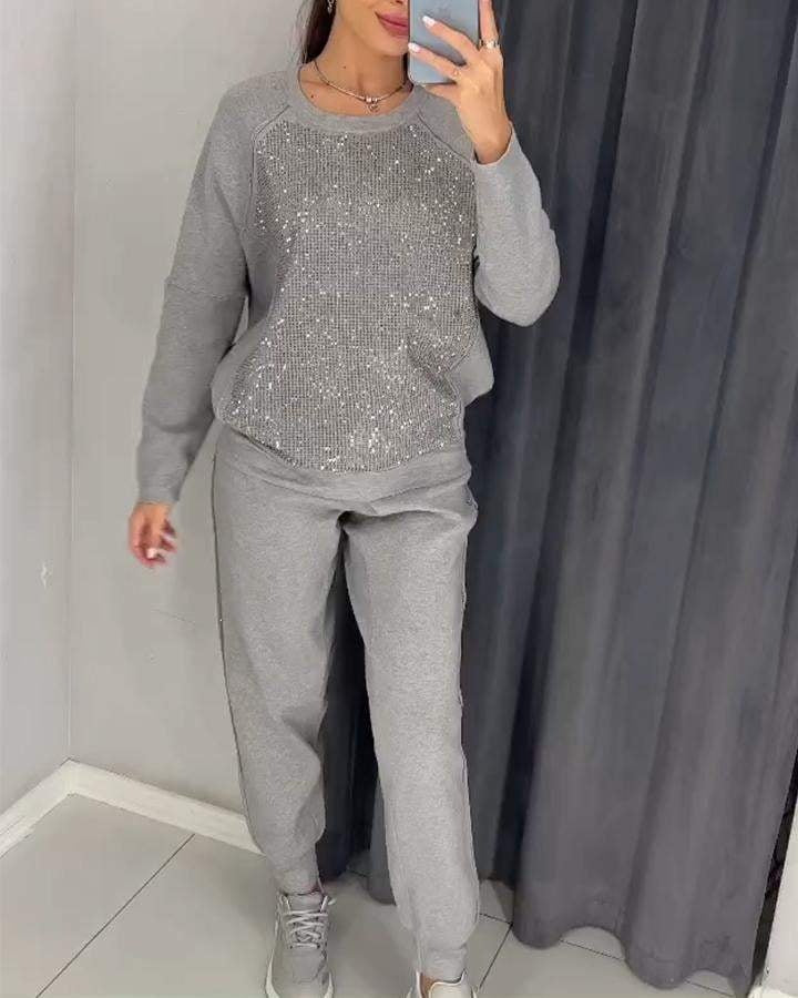 Trendy women’s suit with subtle shimmer details