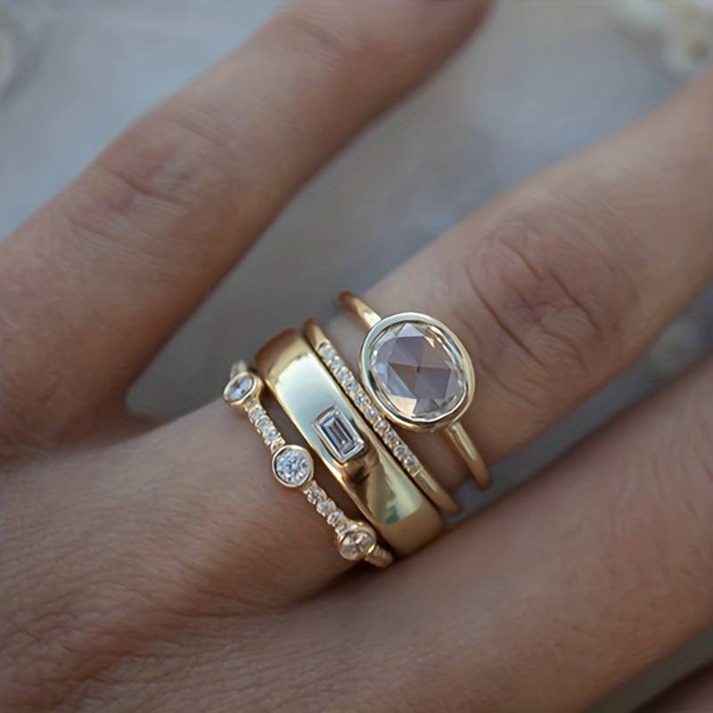 “Vintage Gold Ring Set with Zirconia by Livia, an elegant women's jewelry set”