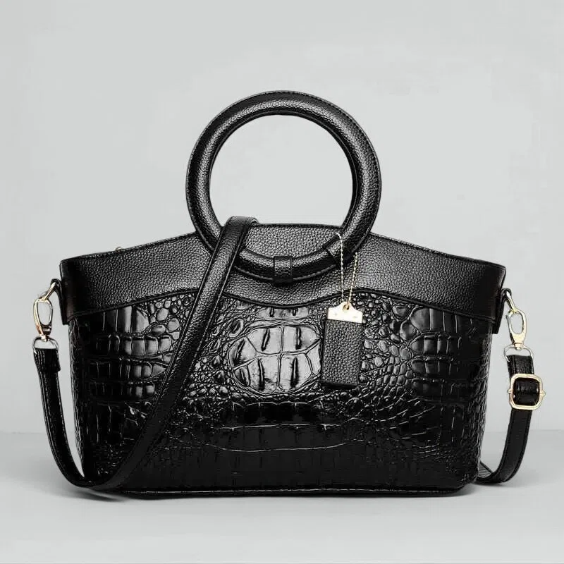 Vintage handtas met crocostructuur en schouderriem