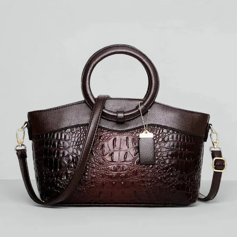 Vintage handtas met crocostructuur en schouderriem