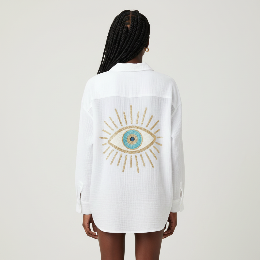 Witte boho blouse met geborduurd oog detail en losvallende pasvorm – Jamie