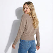 Zachte damestrui met overslaghals en verfijnde uitstraling