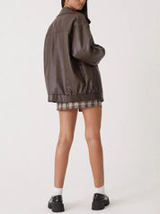 Modern oversized damesjack met rits en brede kraag